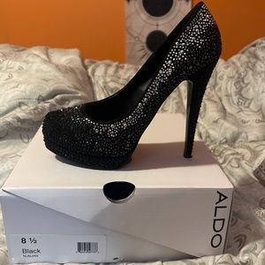Black/silver Aldo platform pumps